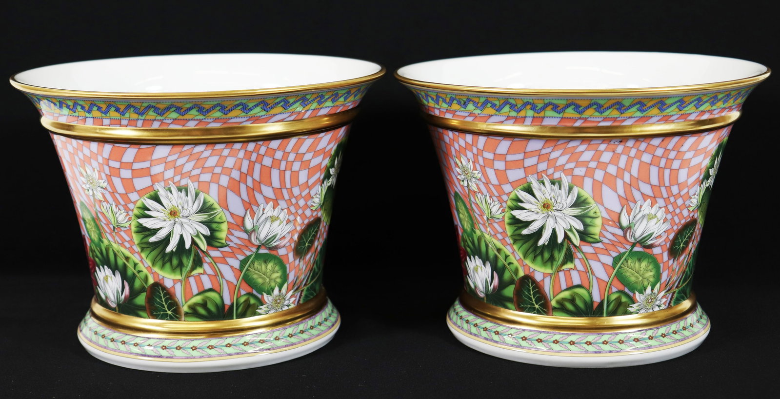 ROSENTHAL VERSACE TROPICAL WONDERLAND VASES 5.75": Two Rosenthal Versace Tropical Wonderland cachepot vases. 5.75" tall 7.5" wide.