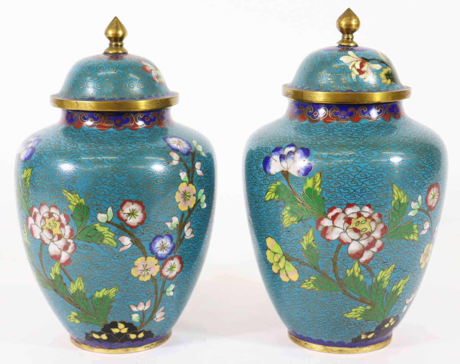 (2) CHINESE CLOISONNE LIDDED URNS: Pair of Chinese blue floral cloisonne lidded urns. 8.25" tall 4.75" wide.