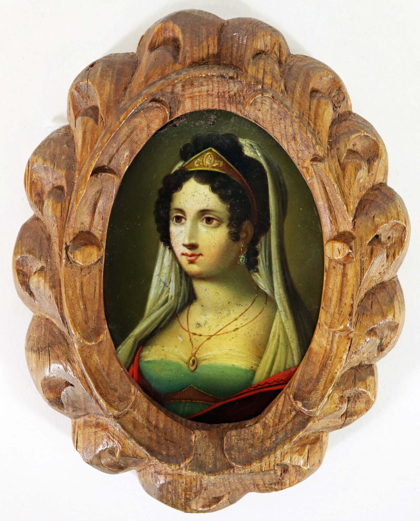 ANTIQUE PORTRAIT MINIATURE PAINTING: An antique portrait of a lady wearing a veil. Possibly Pauline Bonaparte. In a carved wood folk art frame. 5.5" x 4.5" framed.
