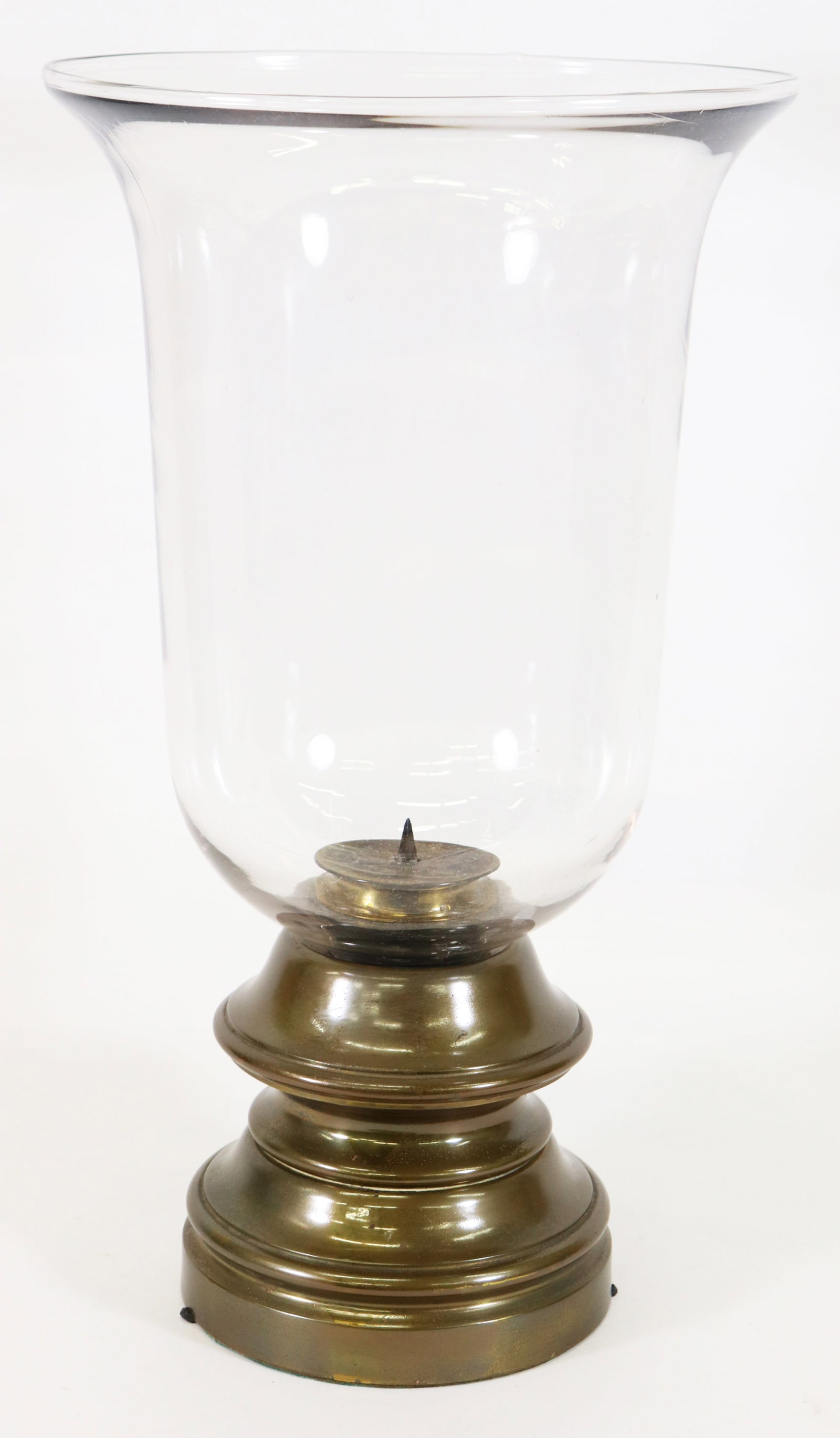 HURRICANE LAMP: Large brass and glass hurricane lamp. Measures 18.25" tall 10.5" wide at top. Local pickup recommended.