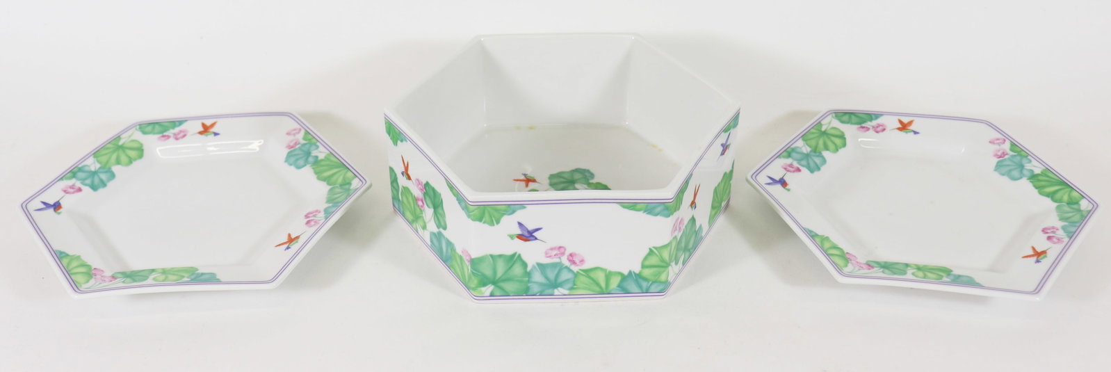 (3) ROYAL COPENHAGEN COLIBRI BOWL AND PLATES: Three piece set of Royal Copenhagen Colibri hummingbird and floral design, six sided bowl with two plates that fit / rest on top of bowl. Colibri number 1810/5475. Bowl measures 3 1/4" tall x 8 1/2"