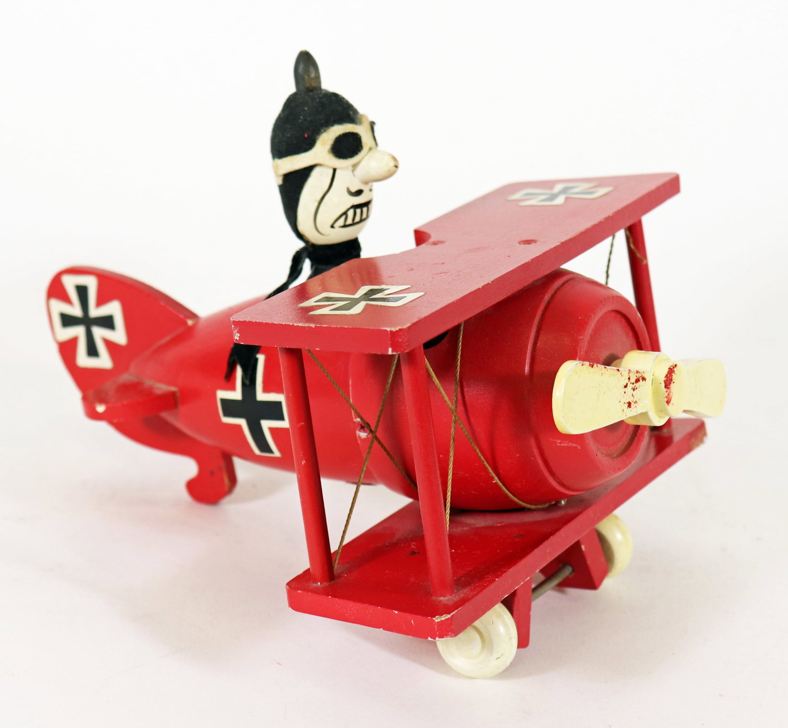 VINTAGE SNOOPY RED BARON SCHMID BROS MUSIC BOX PLANE: Vintage Snoopy Red Baron wood German bi-plane music box by Schmid Bros. Age related wear. Measures 6.5" x 9" x 7".