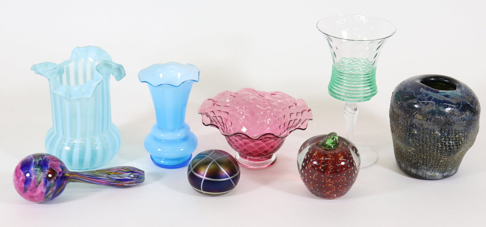 ASSORTED GLASS COLLECTION & MORE: Collection includes a spiral stem wine glass attributed to Fry Glass, signed art glass Raku vase, signed paperweight, Northwood blue fluted stripe glass vase, blue cased glass vase, cranberry glass bo