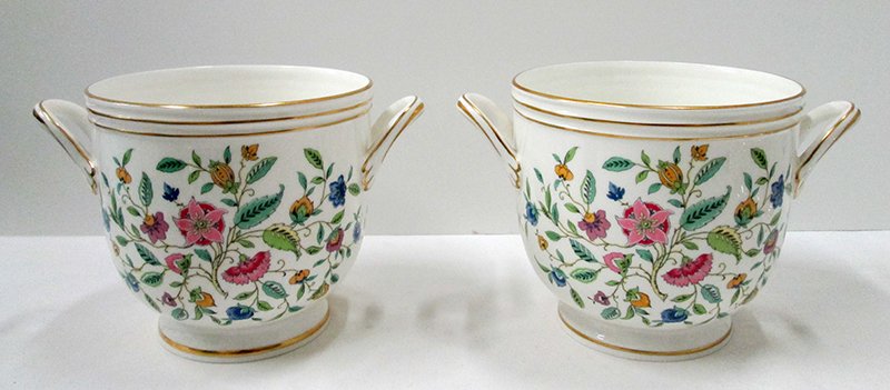 PAIR OF MINTON PLANTER VASES: Two matching double handled Minton planter vases designed by John Wadsworth. 6 5/8" tall 10" wide with handles.