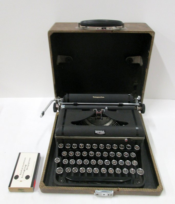VINTAGE ROYAL TYPEWRITER: Includes hard carrying case.