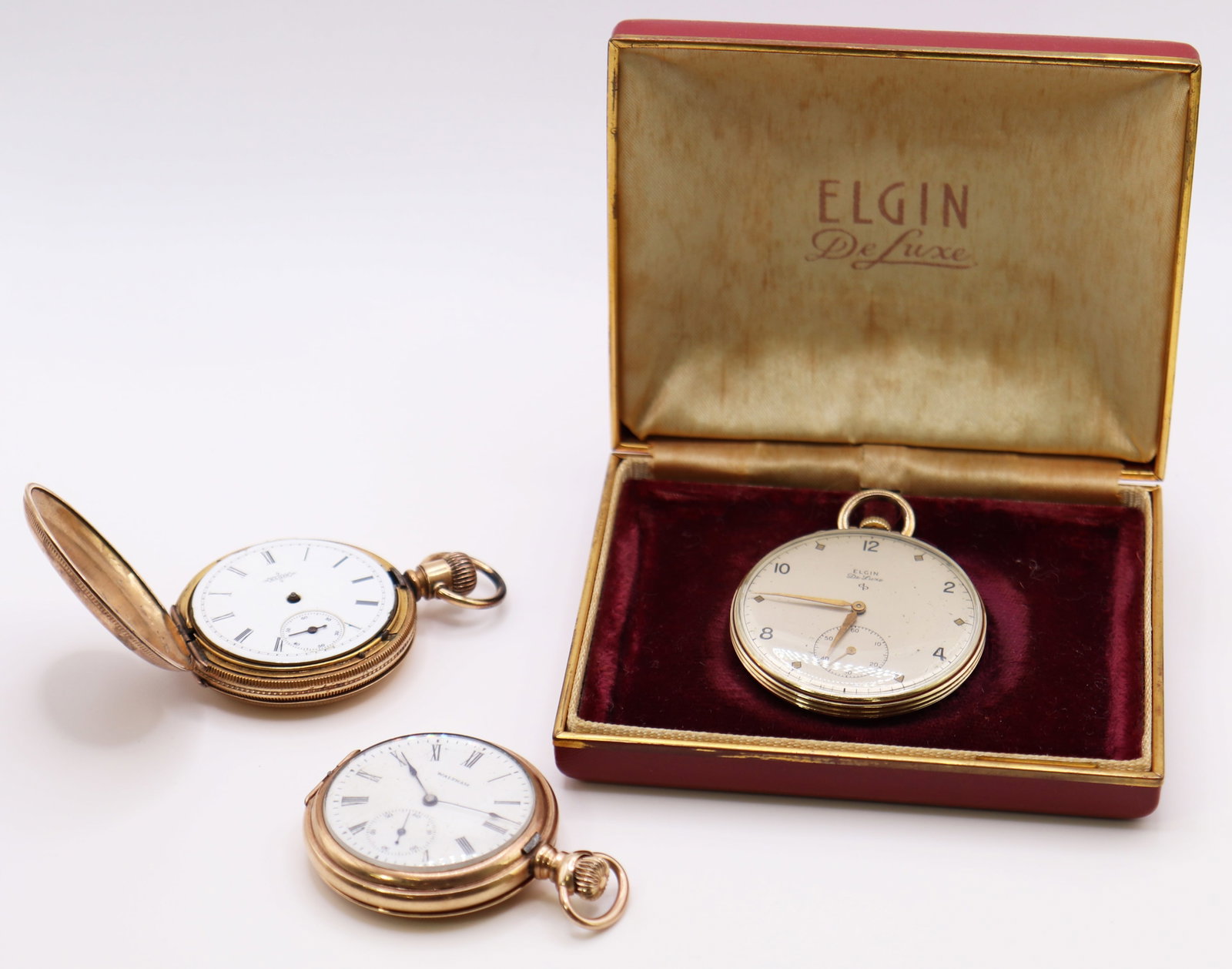(3) ANTIQUE POCKET WATCHES: Collection of (3) pocket watches including two Elgin (one Elgin Deluxe with box) and a Waltham.