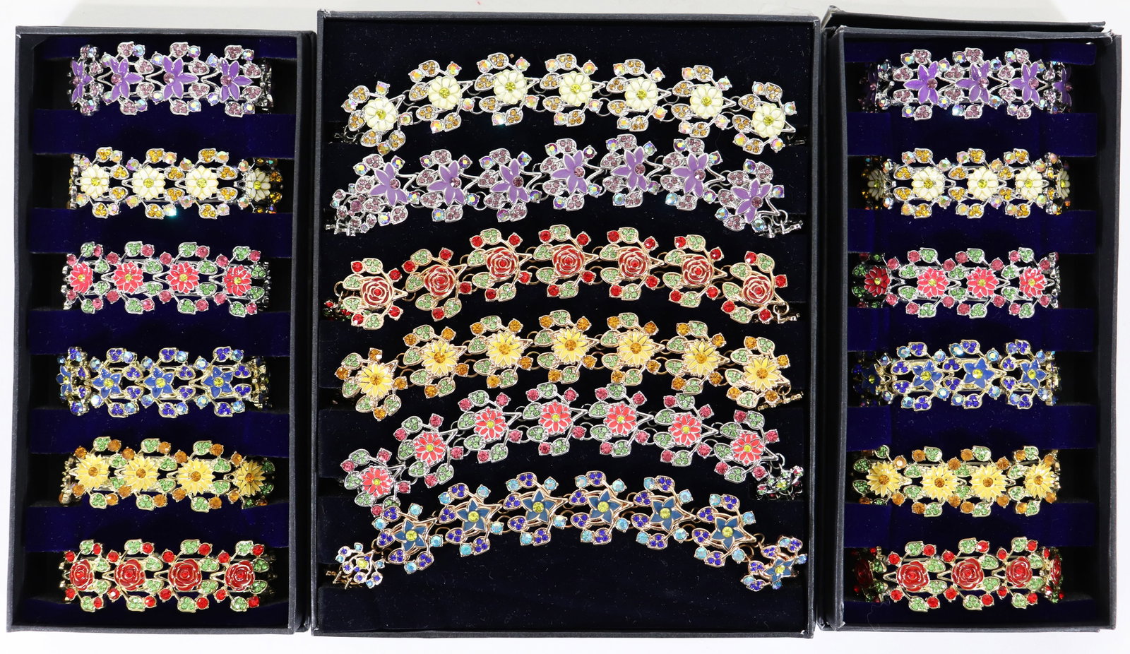 DANBURY MINT "FLORAL" BRACELET & NECKLACES - NEW: A collection of new unworn colorful flower bracelets with matching necklaces from The Franklin Mint collection. There are a total of 12 bracelets and 6 necklaces.
