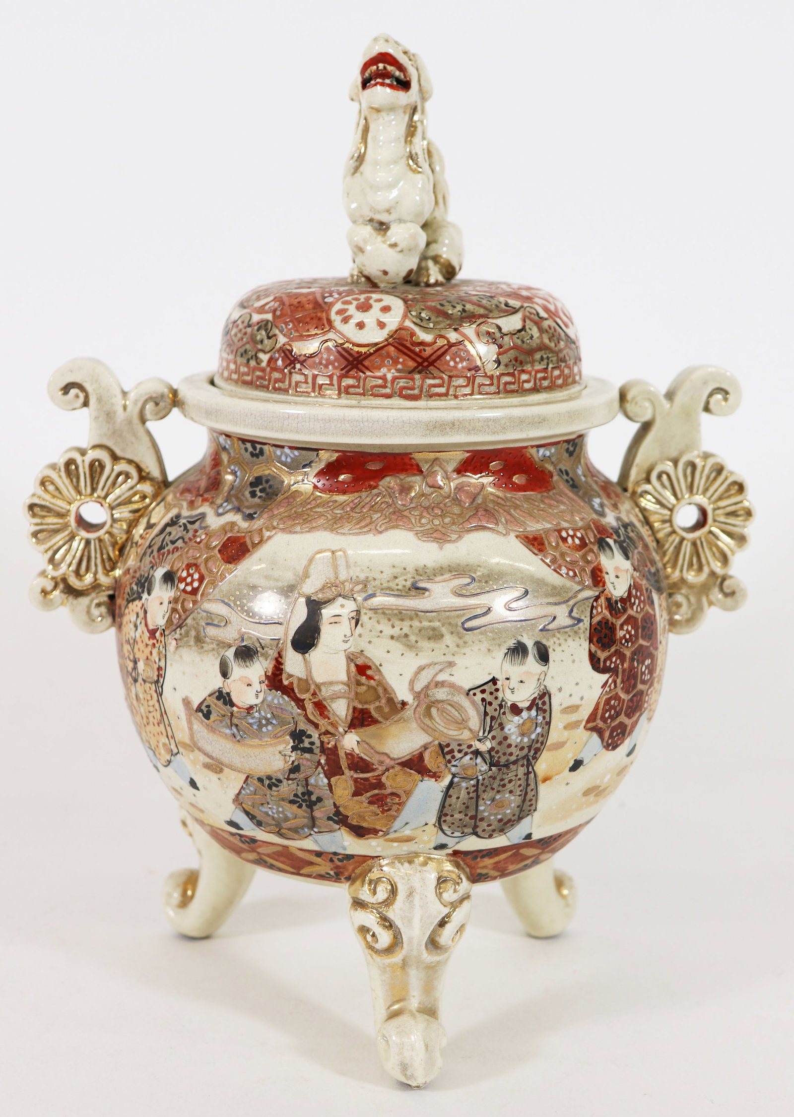 JAPANESE SATSUMA INCENSE BURNER: Japanese Satsuma incense burner with Foo dog / lion finial on lid, hand painted village scenes and traditional figures. Overall measures approx. 12 1/2" x 10" x 8 1/2".