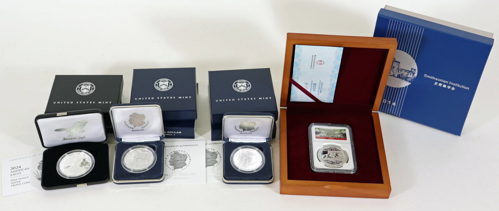 (3) U.S. SILVER DOLLARS & (1) SILVER PANDA COINS (1 of 3)