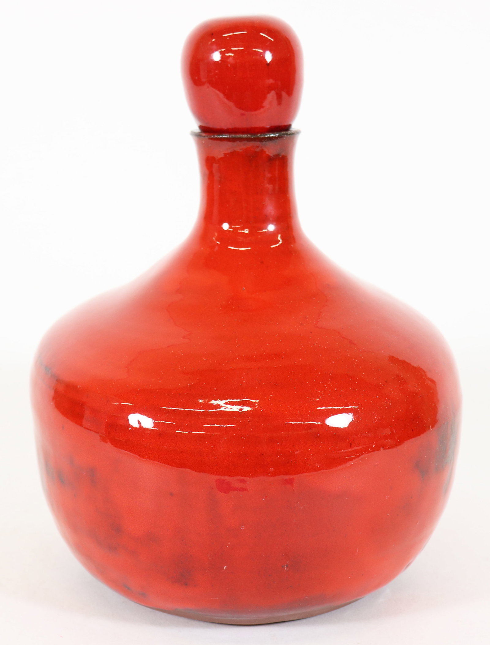MID CENTURY RED DRIP GLAZE POTTERY VASE: A vibrant red pottery vase with a heavy drip glaze with a red top. Signed on base Donya (?) 1154. Measures 10" x 7"