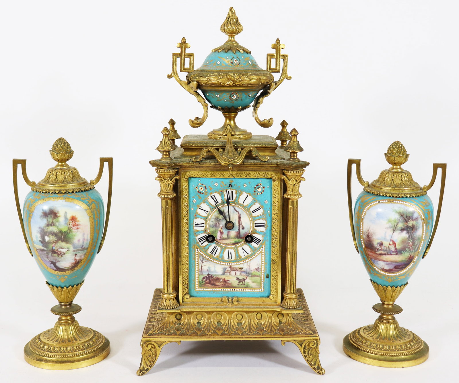 19TH CENTURY FRENCH ORMOLU MANTLE CLOCK & GARNITURE SET: Antique French three piece mantle clock and garniture set. Clock has three hand painted farm scenes and matching garnitures, each side with a hand painted farm scene. Japy Freres movement. Clock measu