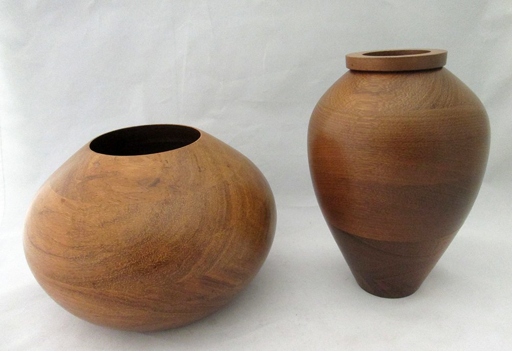 (2) ROBERT ST PIERRE WOOD VASES: Purpleheart Brazil 7 1/2" tall & Burbinga Africa 5 1/4" tall. Both signed on bottom.