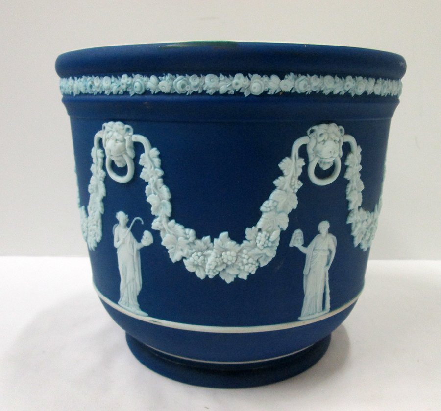 WEDGWOOD BLUE JASPERWARE PLANTER JARDINIERE: Blue jasperware planter with lion head accents and classical figures.