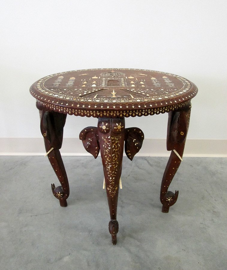 INDIAN TEAK ELEPHANT TABLE: Inlaid teak table with Taj Mahal design and four elephant legs. 20" tall 20" x 16" wide. Some losses to inlay.