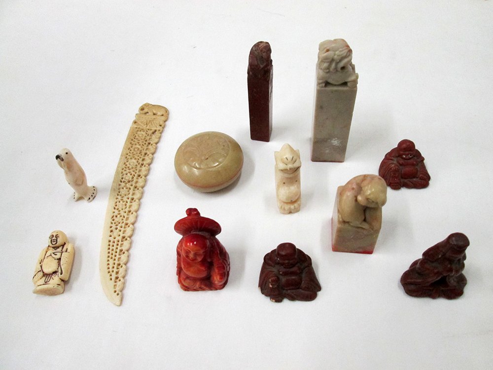 ASIAN COLLECTIBLES: Miniature buddhas, soapstone seals, & more.