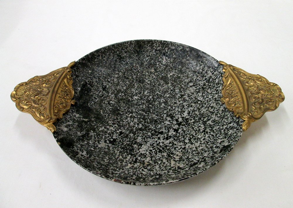 18th CENTURY ORMOLU MOUNTED PORPHYRY BOWL: 18th Century ormolu mounted porphry bowl. Measures 2 1/4" tall 15 1/2" wide with handles 11" without handles.
