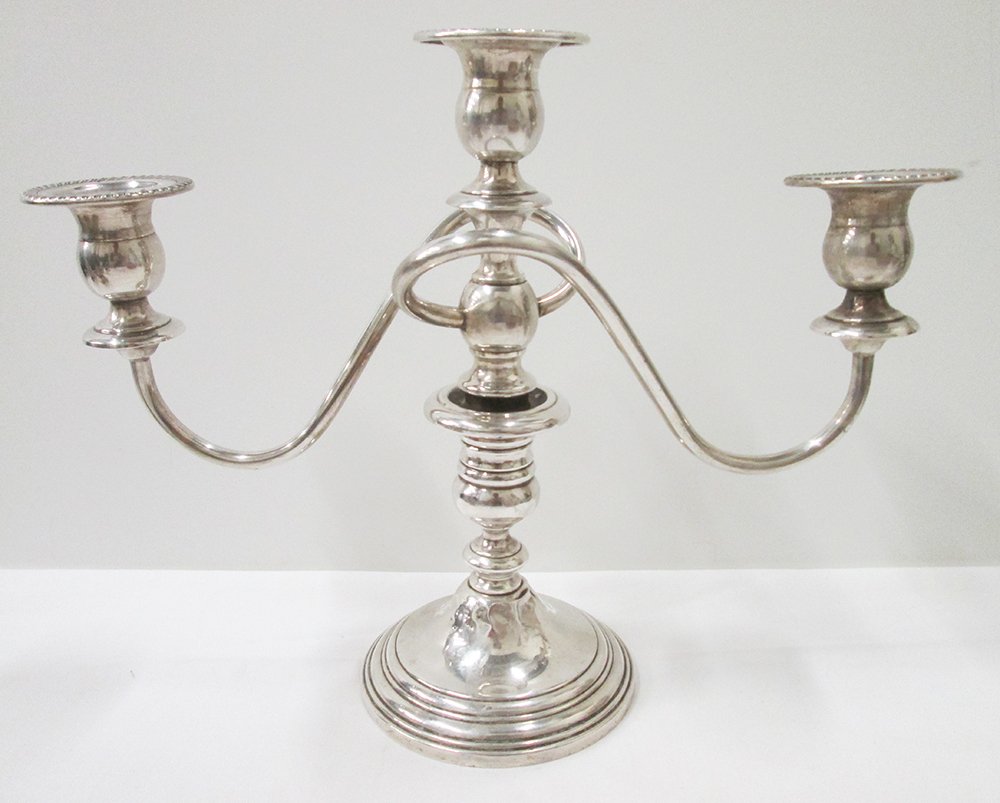 GORHAM STERLING SILVER CANDELABRA: Three arm sterling silver candelabra. 12 1/2" wide 10" tall. Some dings around base.
