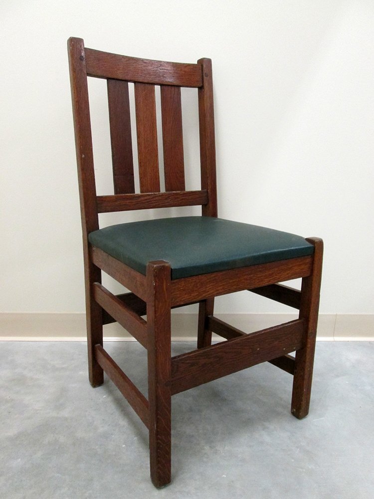 L & JG STICKLEY CHAIR: Oak arts and crafts Stickley chair with three back slats. Measures 35 1/2" tall 17 1/2" x 16" wide.