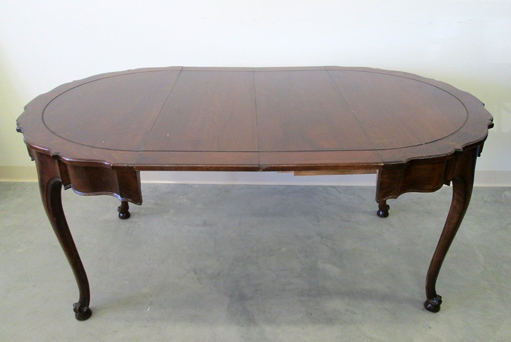 DINING ROOM TABLE: With two leaves, measures 29" Tall 65" x 39" wide with leaves.