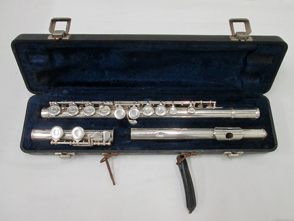 W.T. ARMSTRONG ELKHART FLUTE: Silver Armstrong Elkhart flute with case. Some dents/wear.