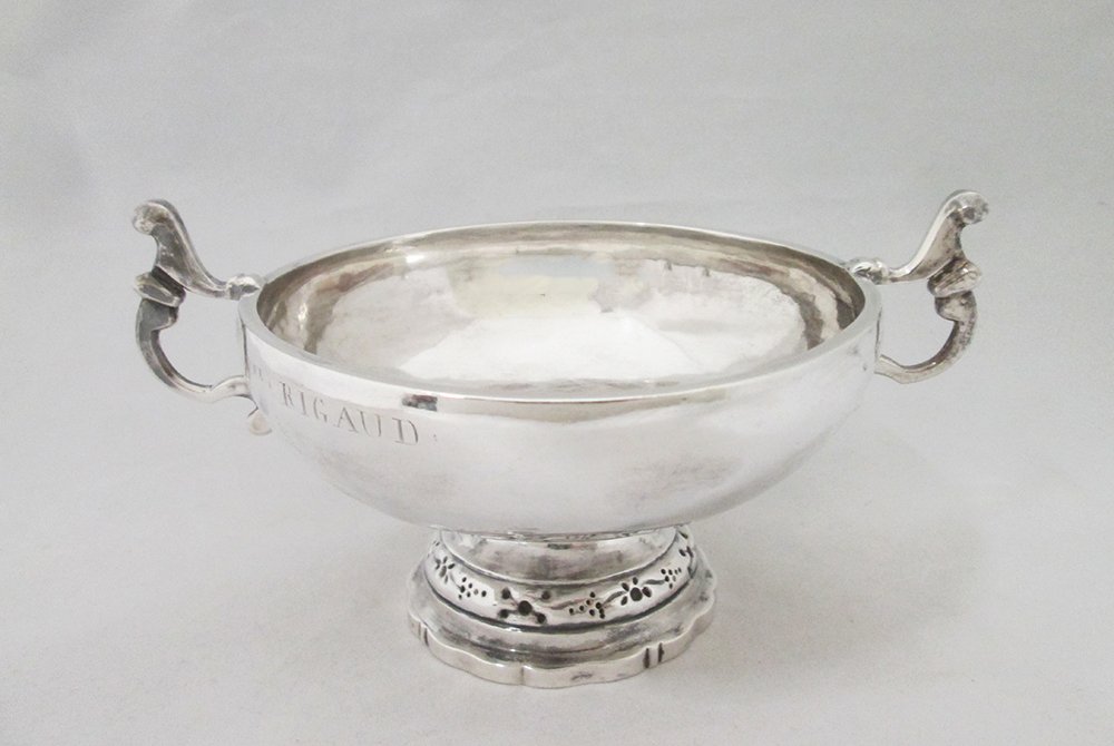 18TH/19TH CENTURY FRENCH SILVER CUP: Hallmarked late 18th or early 19th century silver double handled cup. Hallmarks include 800 silver, 85 Paris, and maker's mark. Marked Rne Rigaud on side. Measures 3 1/2" tall 7" wide with handles. We