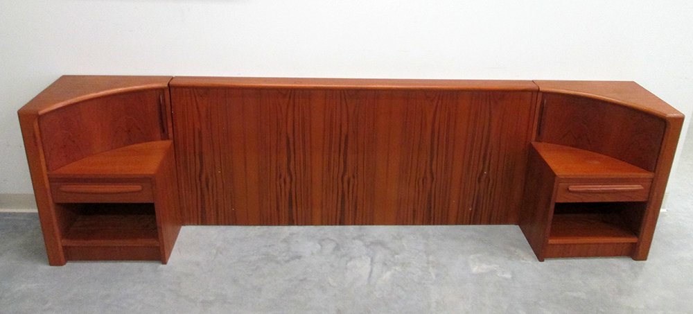 BERNHARD PEDERSEN & SON BED: Danish mid century modern design bed made by Bernhard Pedersen & Son. Bed has headboard connected to nightstands with tambour sliding doors, two drawers, and extending shelf with glass. Bed includes r