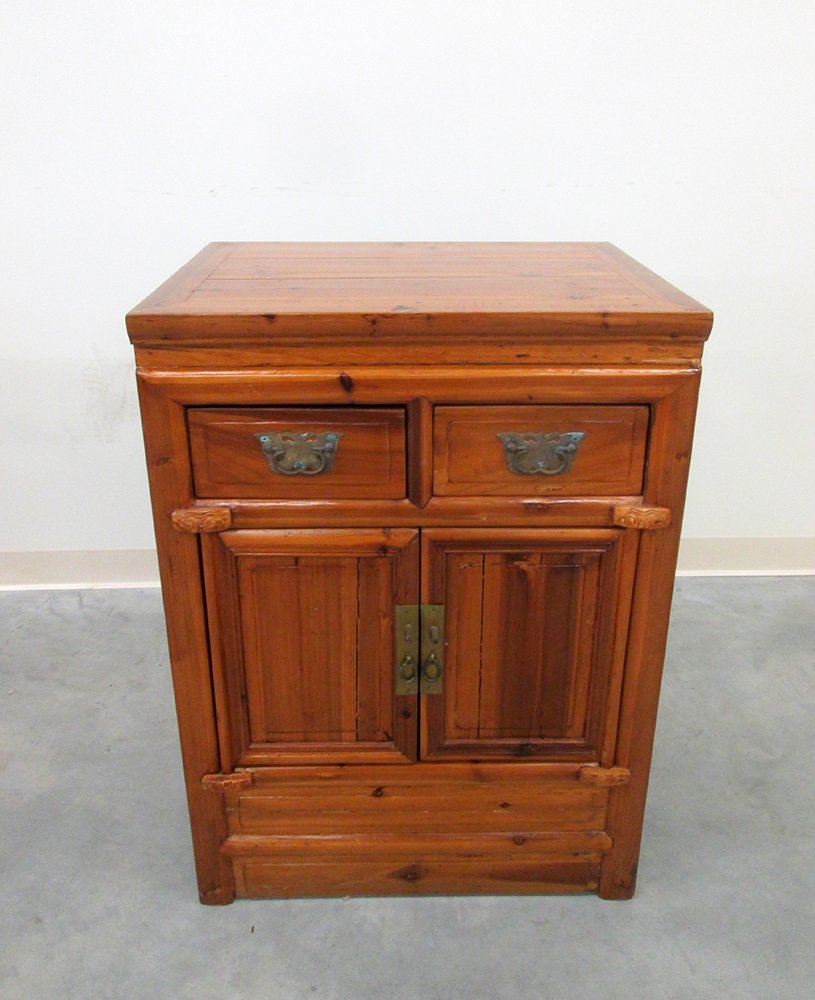 ANTIQUE WASHSTAND: Antique washstand with two doors & two drawers. Measures 34 1/2" tall 25 1/4" x 19 3/4" wide.