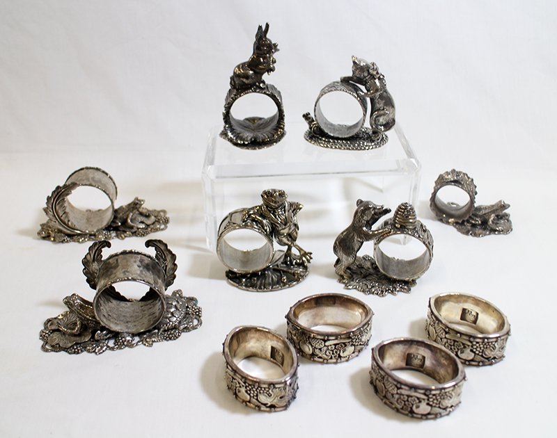 SILVER NAPKIN RING COLLECTION: Collection of napkin rings including (4) Reed & Barton 1824 Collection, (2) matching frog & turtle, (1) frog & lily, (4) matching oval fruit & vegetable (marked with maker's mark and made in Greece).