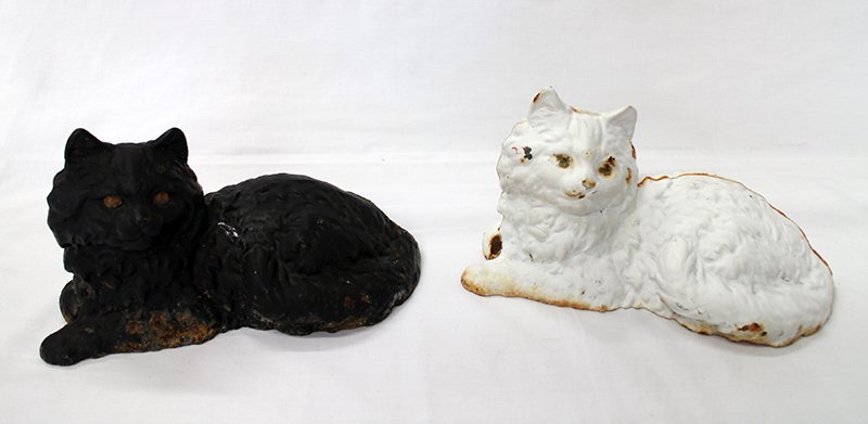 (2) ANTIQUE CAST IRON CAT DOORSTOPS: Pair of black and white cast iron door stops. Measures 10 1/2" long x 6" tall. Believed to be Hubley.