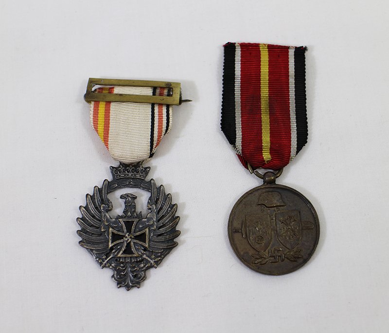 (2) SPANISH BLUE DIVISION GERMAN MEDALS: WWII German medals awarded to Spanish volunteers in the German campaign against the Soviet Union. Provenance: from a private collector who acquired items in Buenos Aries Argentina.