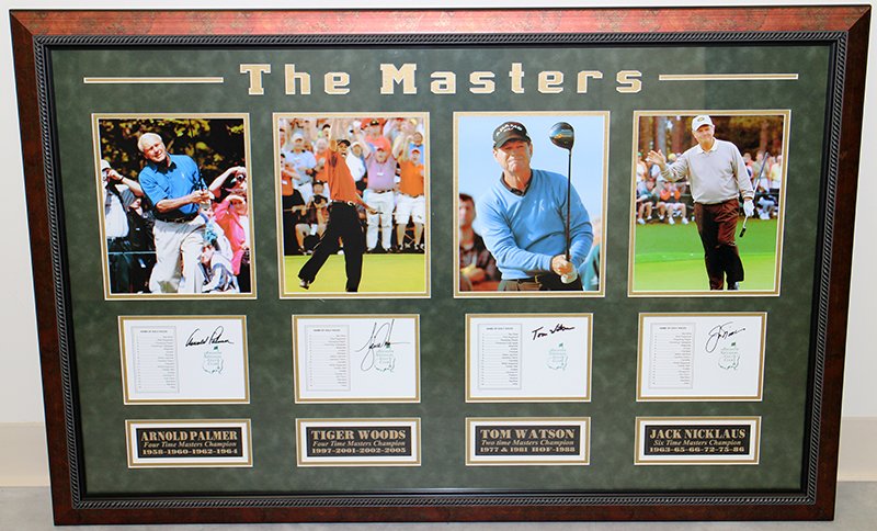 THE MASTERS FRAMED GOLF ART: Framed The Masters golf art with photos and plaques of Arnold Palmer, Tiger Woods, Tom Watson, & Jack Nicklaus. Measures 43 1/2" x 29" with frame.