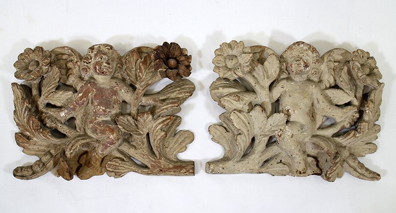 (2) ANTIQUE CARVED OAK CHERUBS: Pair of carved oak gesso angel cherub statue wall decorations. Measures 10" x 7".
