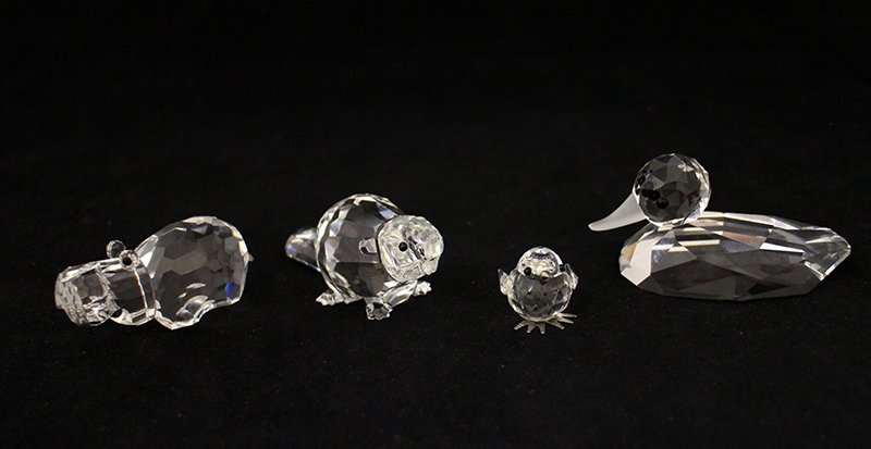 (4) SWAROVSKI CRYSTAL FIGURINES: Beaver, hippo, duck and chick.
