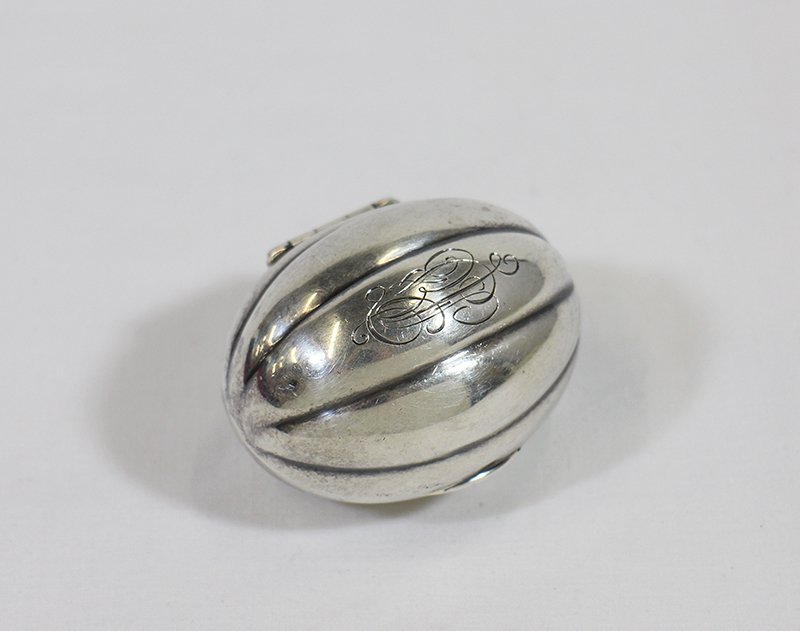 STERLING SILVER NUTMEG GRATER: Rare Gorham sterling silver nutmeg grater. Measures 2 1/8" long and weighs 1.22 OZT.