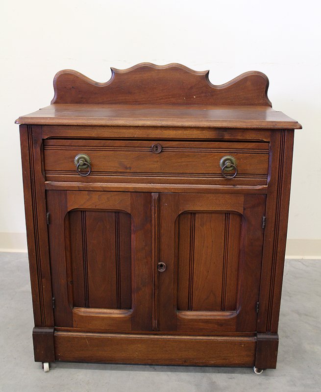 EASTLAKE DRY SINK: Eastlake mahogany dry sink with one drawer and double doors. One plank on top loose. 30 1/2" tall 30" x 16" wide.