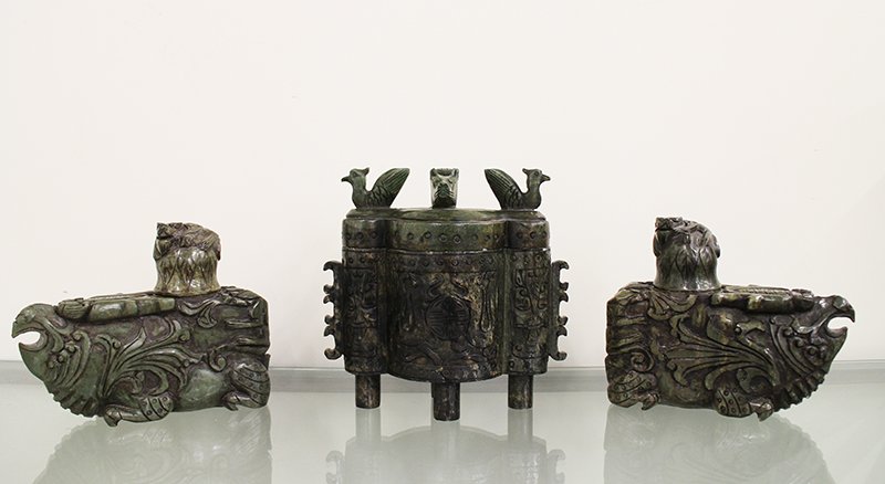 (3) STONE CENSERS: Three green stone Chinese style censers. Possibly soapstone. Middle 9" wide 9 1/2" tall, two matching 8 3/4" long 7 1/4" tall.