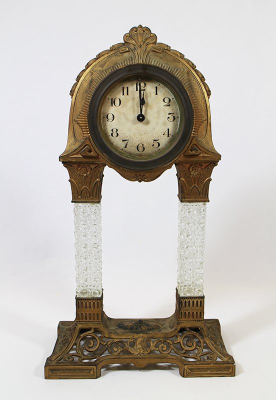 GOLD ORMOLU CUT CRYSTAL MANTLE CLOCK: Antique mantle clock with cut glass crystal columns. Clock is not working. Measures 16.5" tall.