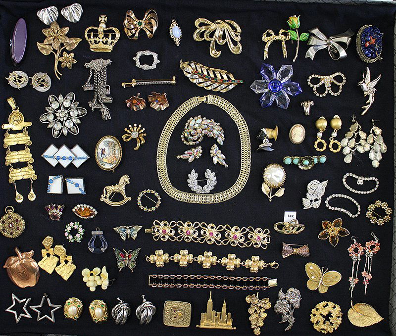 VINTAGE COSTUME JEWELRY: Coro, Regency, 14K gold bow brooch, Blackamoor pin, Sarah Coventry, Lucite, JJ, sterling, Erwin Pearl, Jordan, & more.