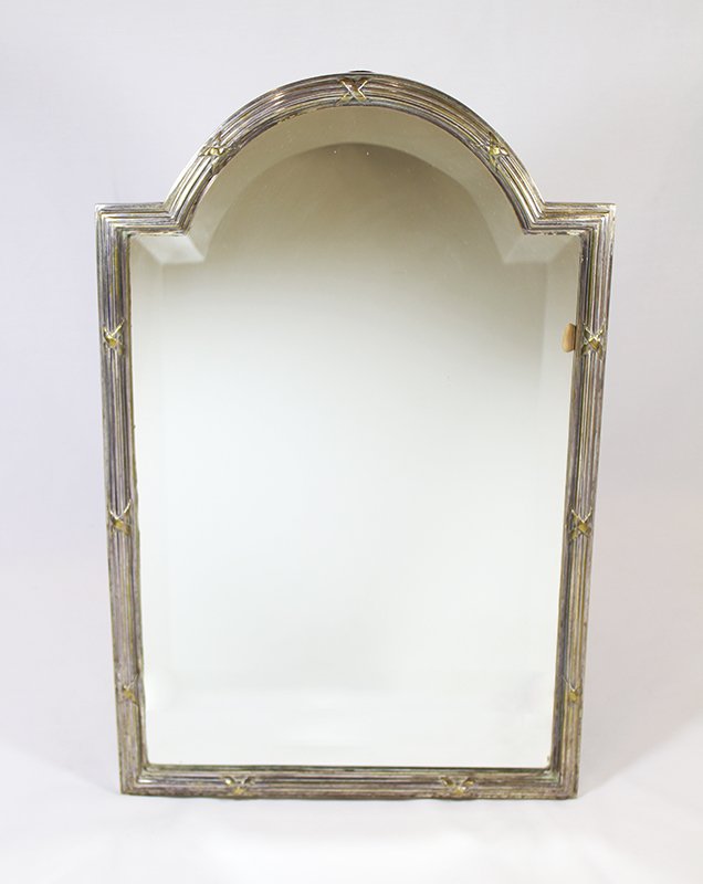 ANTIQUE SILVERPLATE MIRROR: Heavy easel back silverplate mirror with X designs. 20 1/4" x 13 1/4" wide.