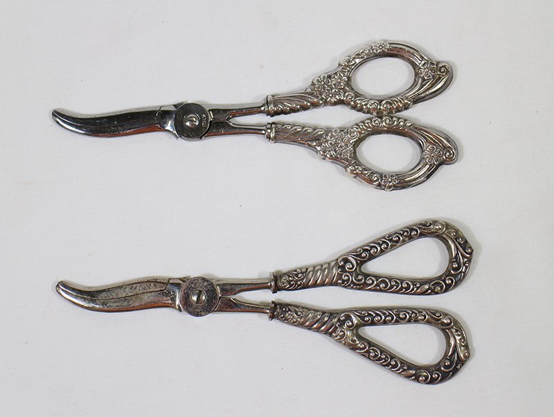 (2) ANTIQUE STERLING SILVER GRAPE SHEARS: 2 sterling handled grape scissors. One is marked Voss Germany and the other Italy.
