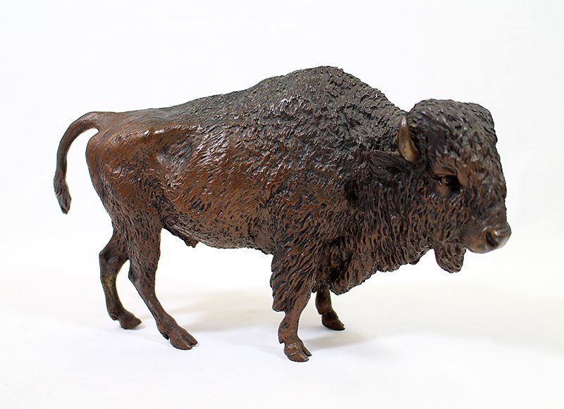 AUSTRIAN BRONZE BISON: Austrian cold painted bronze bison. Stamped Austria on bottom. In the manner of Franz Bergman. 11" long 6 1/4" tall.