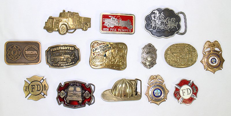 FIREFIGHTER BELT BUCKLES & BADGES: Collection of fire fighter brass belt buckles (BTS, BBB Brass Baron Buckle) and Fire Marshall badges - two from Jupiter Tequesta Florida and one from the Boston Fire Department.