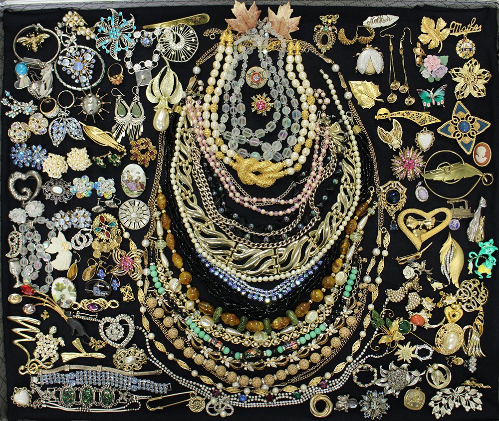 VINTAGE COSTUME JEWELRY: Collection of jewelry to include Gucci, sterling, Coro, Sarah Coventry, Trifari, Art, Castle Cliff, Lisner, 1988 fm, Limoges, Bogoff, BSK, Davoy's, JJ, Monet & more.