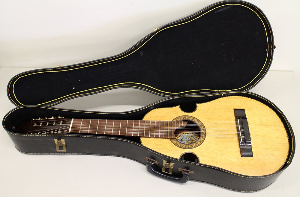 PUERTO RICO CUATRO GUITAR: Puerto Rican Cuatro guitar with case. Includes original purchase receipt. Guitar 34 1/4" long.