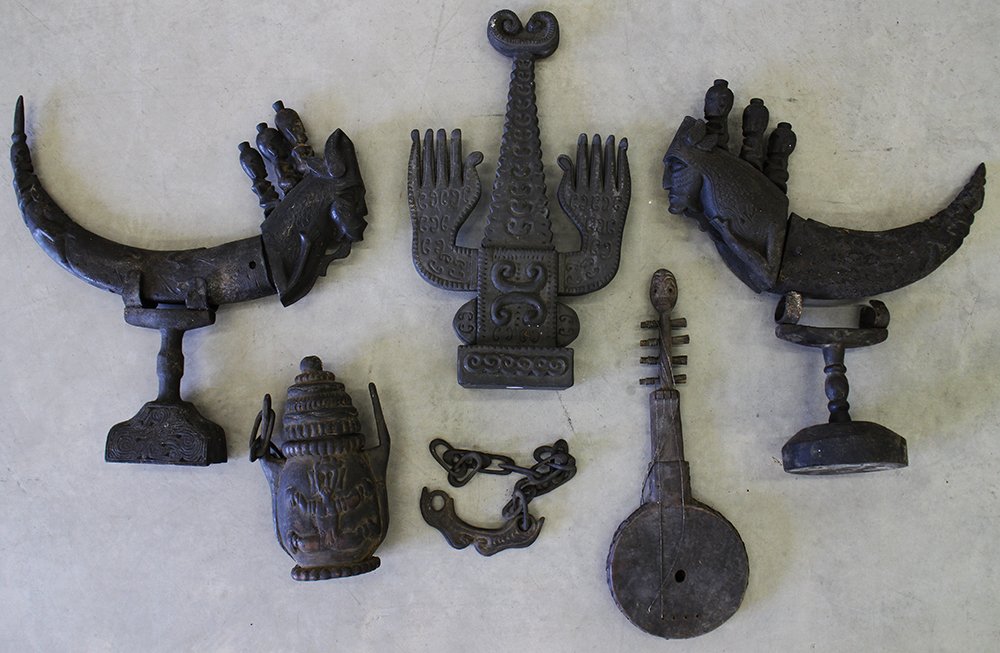 PRIMITIVE WOOD CARVINGS: Collection of primitive tribal wood carvings, African or Indonesian with instrument, lidded jar urn with wood chains, & more.