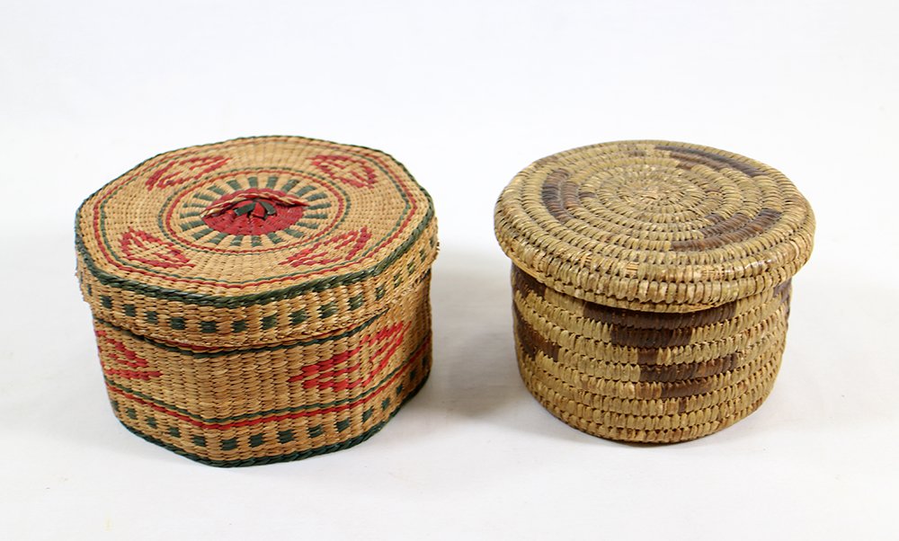 (2) NATIVE AMERICAN LIDDED BASKETS: Two Native American Indian baskets, one green & red lidded and other possibly Cherokee. 5" wide 3 1/4" tall and 5 1/2" wide 3" tall.
