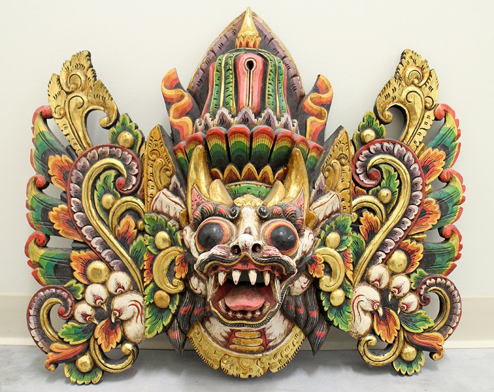 INDONESIAN GARUDA CARVING: Wood garuda wall carving. 29" wide 24" tall.