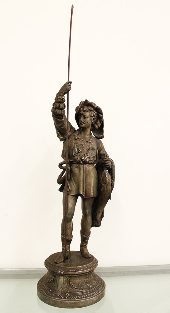 SPELTER FISHERMAN STATUE: Spelter metal fisherman statue. 20" tall to top of hand (spear removable).