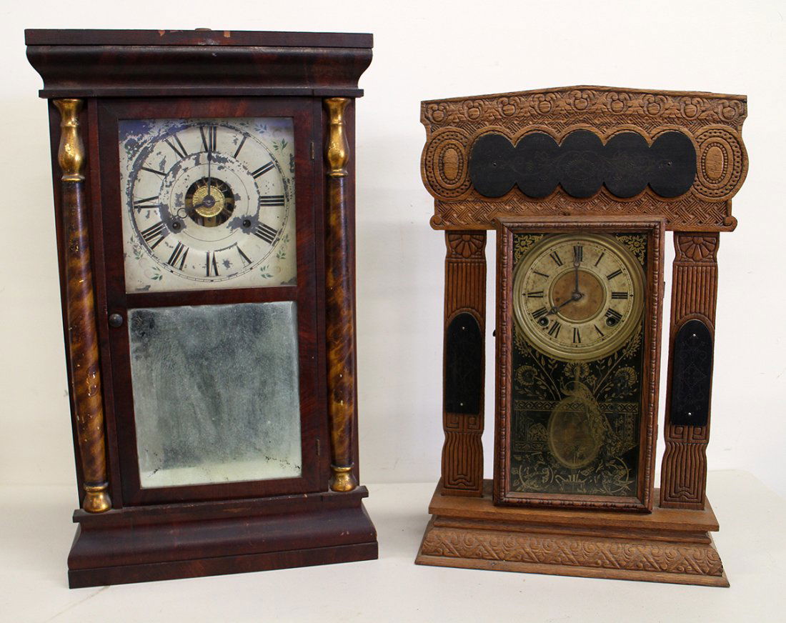 (2) ANTIQUE CLOCKS: Victorian era Seth Thomas & Ingram gingerbread mantle clocks. 25" & 22 3/4" Tall.