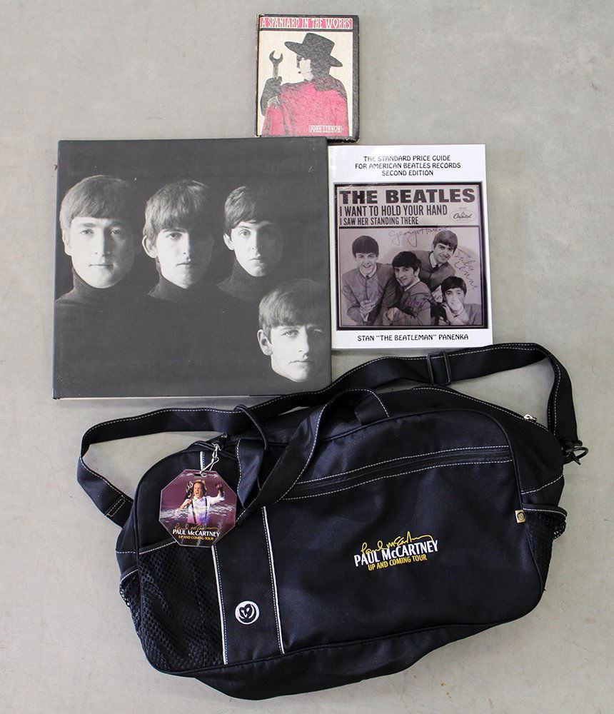 BEATLES BOOKS & PAUL MCCARTNEY TOUR BAG: A Spaniard in the Works by John Lennon 1965, The Beatles A Private View by Robert Freeman, The Standard Price Guide for American Beatles Records Second Edition. Included is a special promotion travel